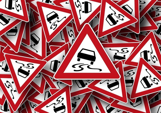 What Info would be shown in a Triangular Road Sign?